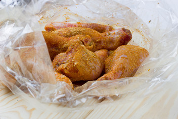 Chicken in spices for baking