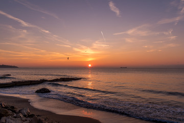 Fototapeta premium Early autumn sea sunrise at the beach.
