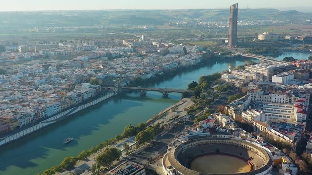 Aerial view of Seville, famous European historic city and capital of Andalusia, (corrida bullring) bullfighting arena (Plaza de toros de la Real Maestranza de Caballeria de Sevilla) - Spain, Europe