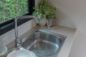 sink with faucet in kitchen room