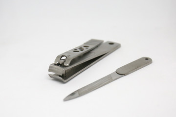 A nail clipper is a hand tool used to trim fingernails