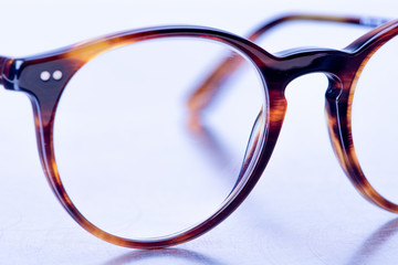 Brown reading glasses close-up