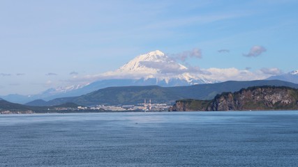 Koryaksky volcano towers over the city of Petropavlovsk-Kamchatsky. Koryaksky or Koryakskaya Sopka is an active volcano on the Kamchatka Peninsula in the Russian Far East.