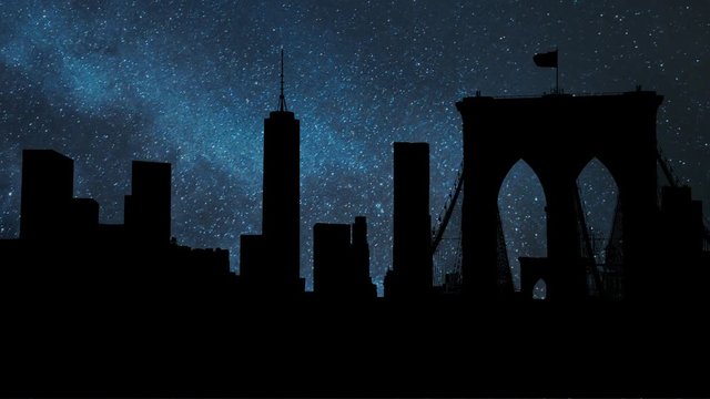 New York: Famous Skyline of Downtown from Brooklin Bridge by Night with Stars and Milky Way in Background, Manhattan, New York City, USA