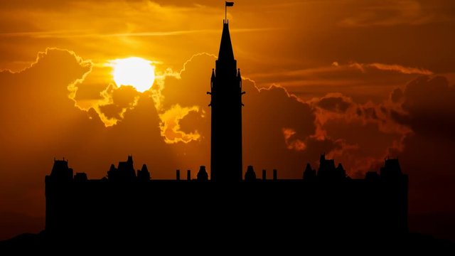 Parliament Hill (Colline du Parlement) and Its Gothic revival suite of Buildings in Silhouette at Sunset, Ottawa, Ontario, Canada