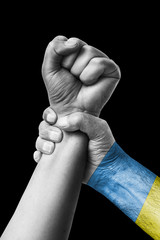 Fist painted in colors of canary islands flag, fist flag, country of canary islands