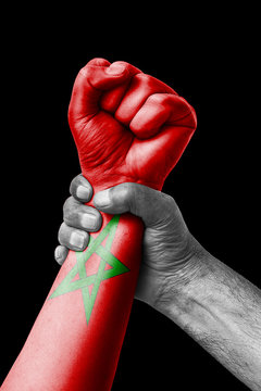 Fist painted in colors of Marocco flag, fist flag, country of Marocco