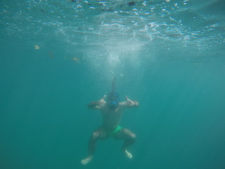 Obraz premium Guy snorkeling in the Philippines