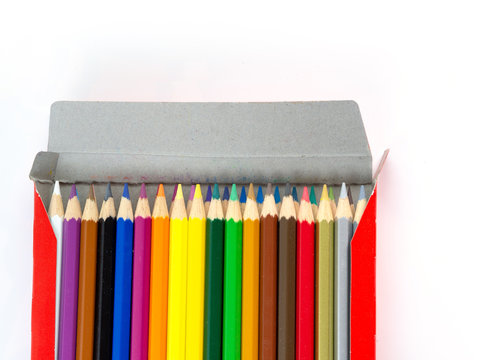 Multicolored pencils with free space for text on white background, Color pencils in box isolated