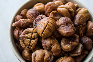 Peeled Roasted Raw Organic Chestnuts in Bowl.