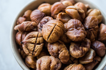 Peeled Roasted Raw Organic Chestnuts in Bowl.