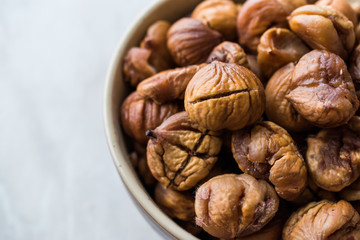 Peeled Roasted Raw Organic Chestnuts in Bowl.