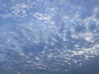 Dramatic​ clouds and skies, wonderful sky as background, full frame shot of scattered clouds in the blue sky.