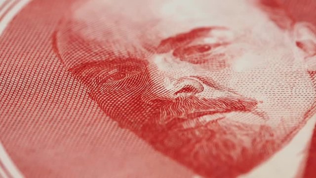 Vladimir Lenin on old Russia rouble macro slow rotating. Low angle. Stock video footage