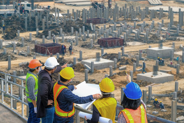 Engineers Meeting for successful project construction Team of professional engineers working with...