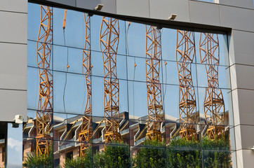 Big lifting crane in the construction site
