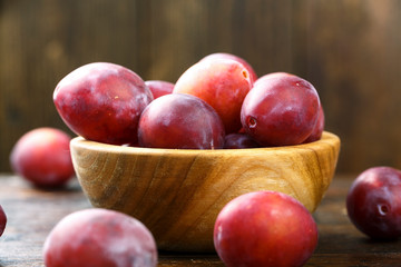 ripe plums place for text