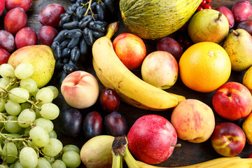 many ripe fruits as background