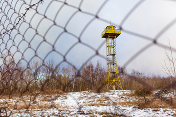 observation tower behind the net fence