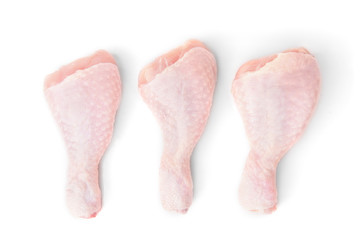 Raw chicken legs isolated on white background.