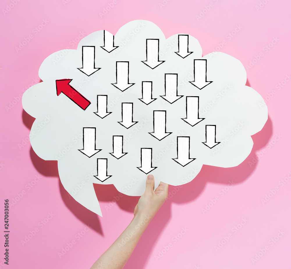 Poster arrow going in a different direction with a speech bubble on a pink background