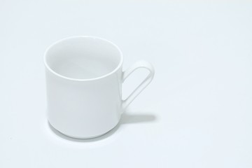 An empty coffee cup on white paper background 