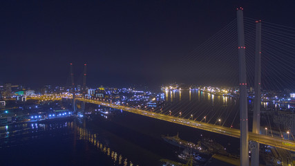 Obraz na płótnie Canvas Aerial view of the Golden bridge at night.