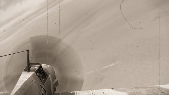 Dogfight - Air combat between two propeller military fighter aircrafts from the WW2 - old vintage movie loock