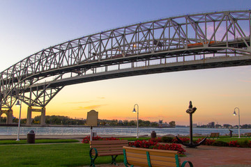 Blue Water Bridge Sunrise. Dawn over the towns of Port Huron, Michigan and Sarnia, Ontario on the...