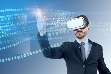 Businessman in vr glasses, binary interface