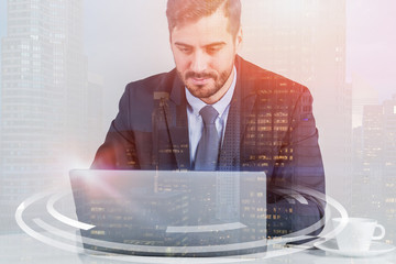 Businessman with laptop, hud interface