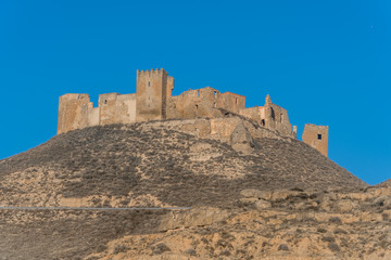 Aerial view of the ruined medieval abandoned Montearagon castle, namesake of the famous kingdom on...
