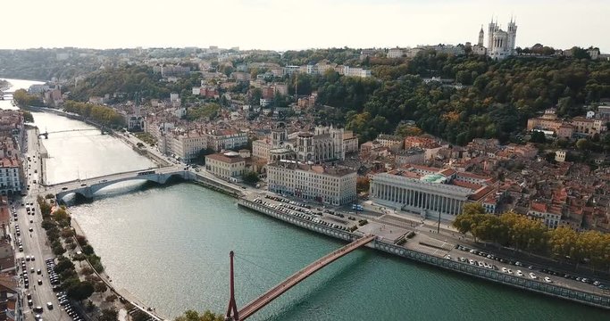 View from drone of Cathedral of Saint-Jean and Notre Dame Basilica on Fourviere hill on bank of river Saone in Lyon, France 