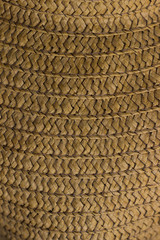 Texture of straw hat close up. Straw hat, close up detail.