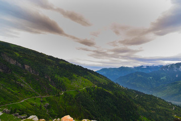 A narrow road through the mountains 