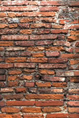 Old orange brick wall, close up.