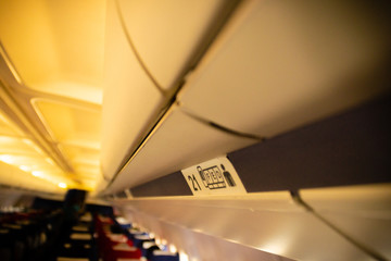 Overhead compartment in an airplane 