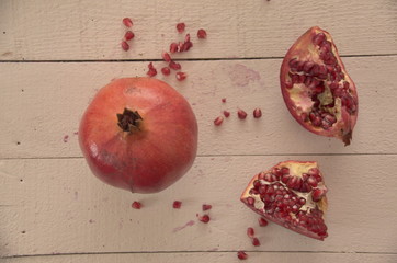 pomegranate on  wooden table