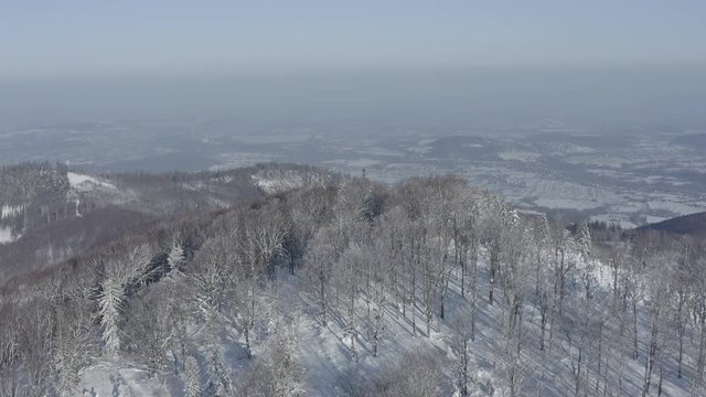 Winter scenery in Silesian Beskids mountains. View from above. DJI Mavic 2 Pro 4k dlog-m ungraded flat.