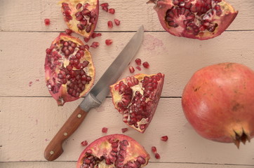  pomegranate on a wooden board