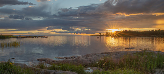 Scenic view of a rocky coast in sunset