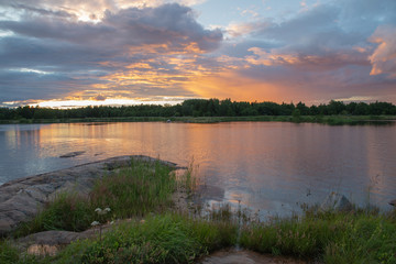 Scenic view of a rocky coast in sunset