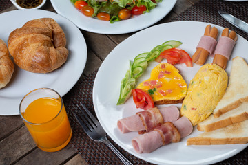 Food series: American breakfast set on wooden table