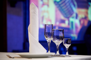 Empty glasses on the banquet table.Table setting for a banquet or dinner party.