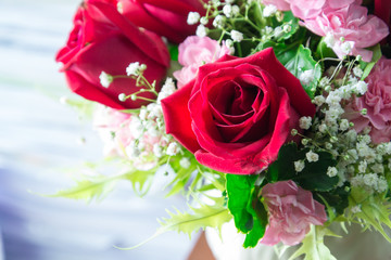 Colorful flower bouquet from red roses ,Roses in a brides flower bouquet.