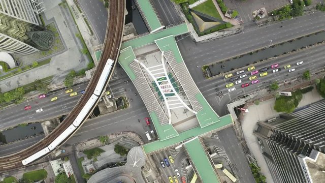 Aerial View of intersection and traffic in Central Business District of Bangkok city Thailand.