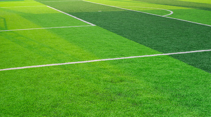 Soccer field grass conner.pattern of fresh green grass for football