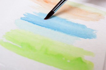 Watercolor drawing with brush Green blue colors strokes texture