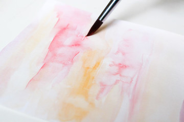 Watercolor painting with brush Pink orange texture