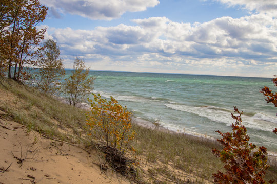 Lake Michigan Beach. View from the top of a Lake Michigan sand dune over the sunny blue waters of Lake Michigan.